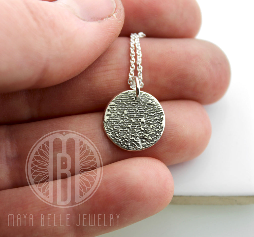 Zoomed in image of baby footprint details made of fine silver - Maya Belle Jewelry