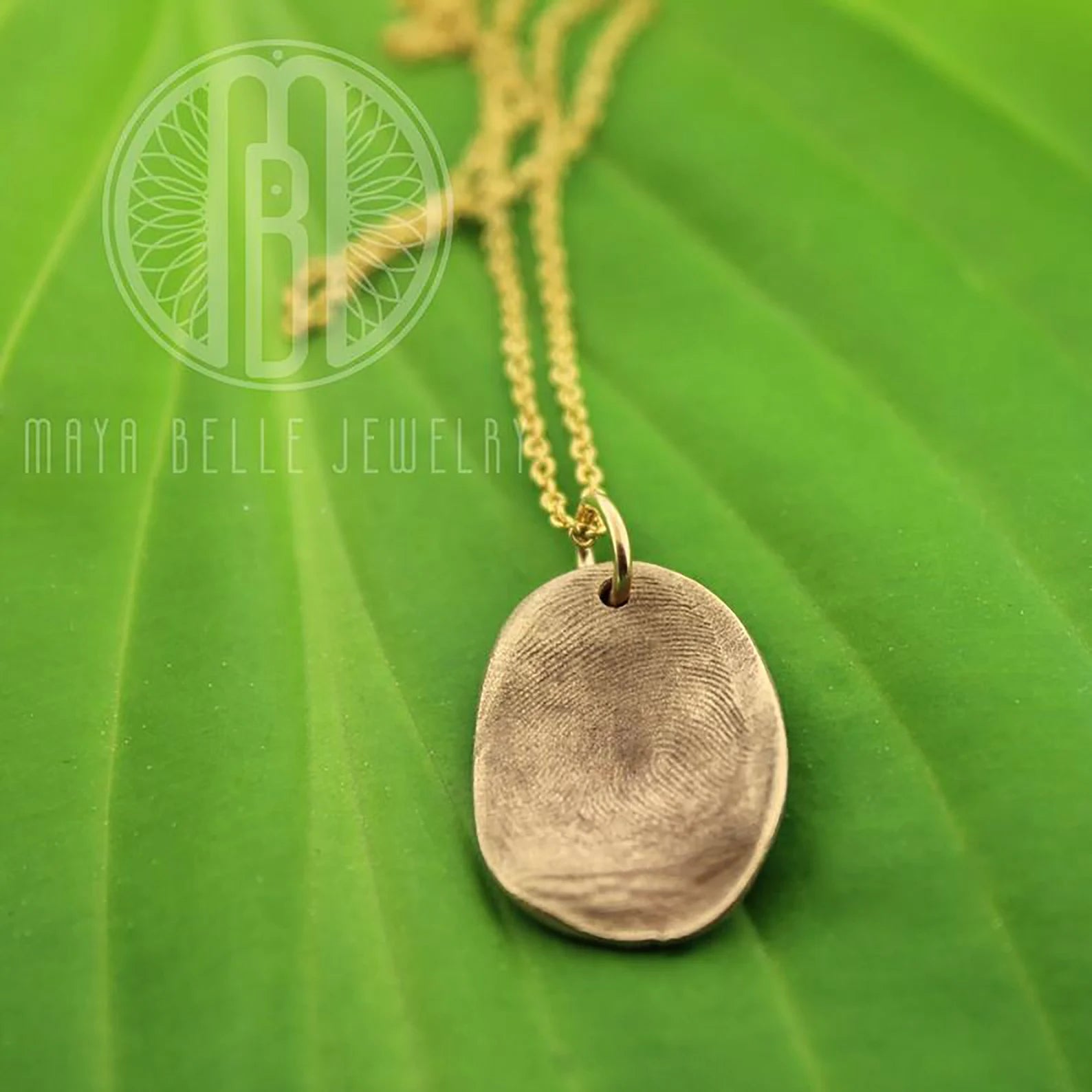 Child's molded fingerprint necklace