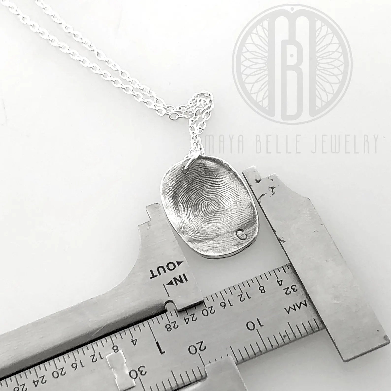 Child's molded fingerprint necklace