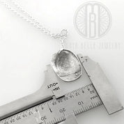 Child's molded fingerprint necklace