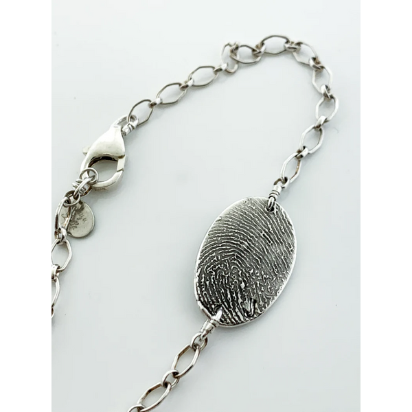 Fingerprint Keepsake Charm Bracelet - Customer's Product with price 293.00 ID 2iqejcSa736uPCImrlFBQhv4 - Maya Belle Jewelry 